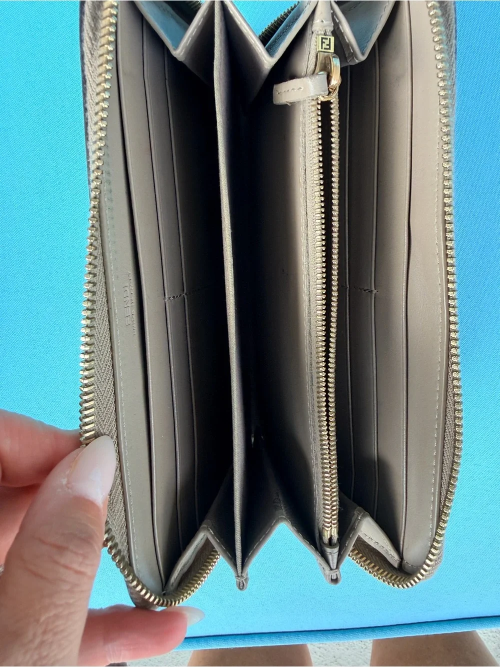 Fendi Zip-Around Wallet in Taupe with Gold Logo. AUTHENTIC